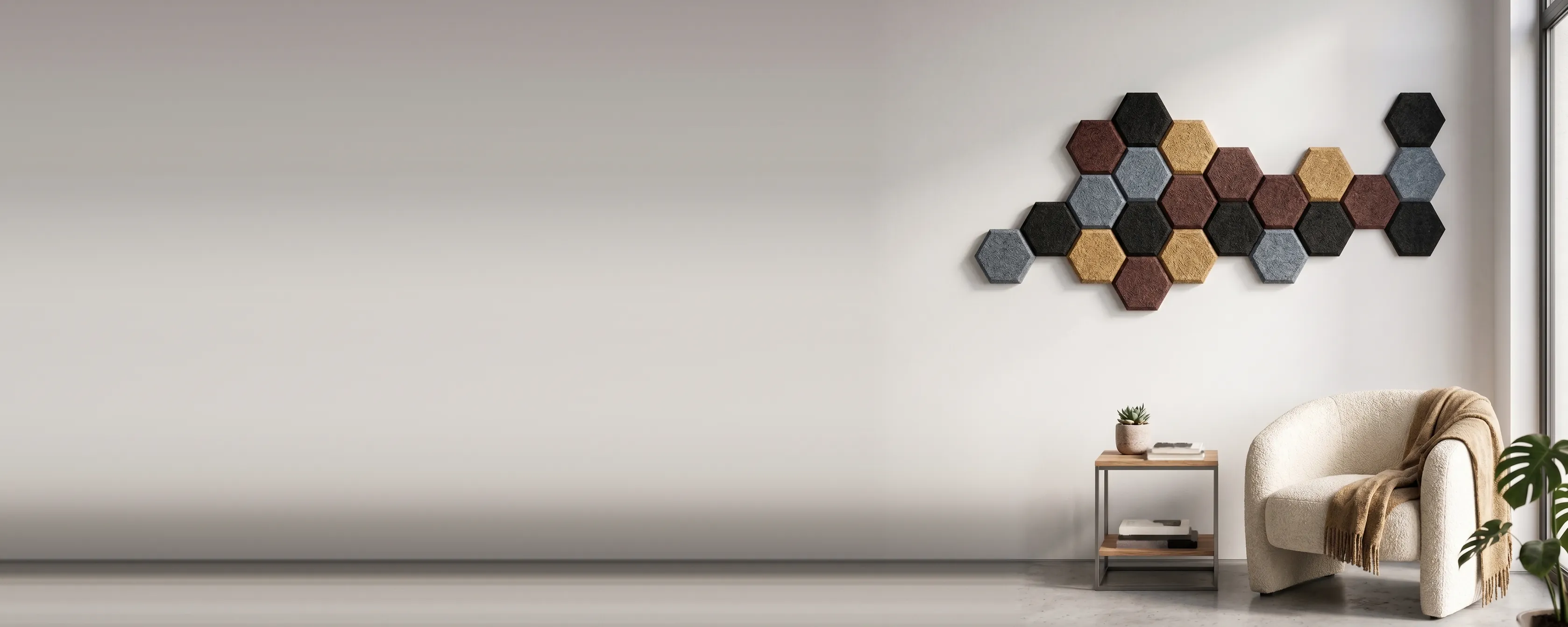 Hexagonal EcoMur panels in natural, terracotta, grey and black on a living room wall